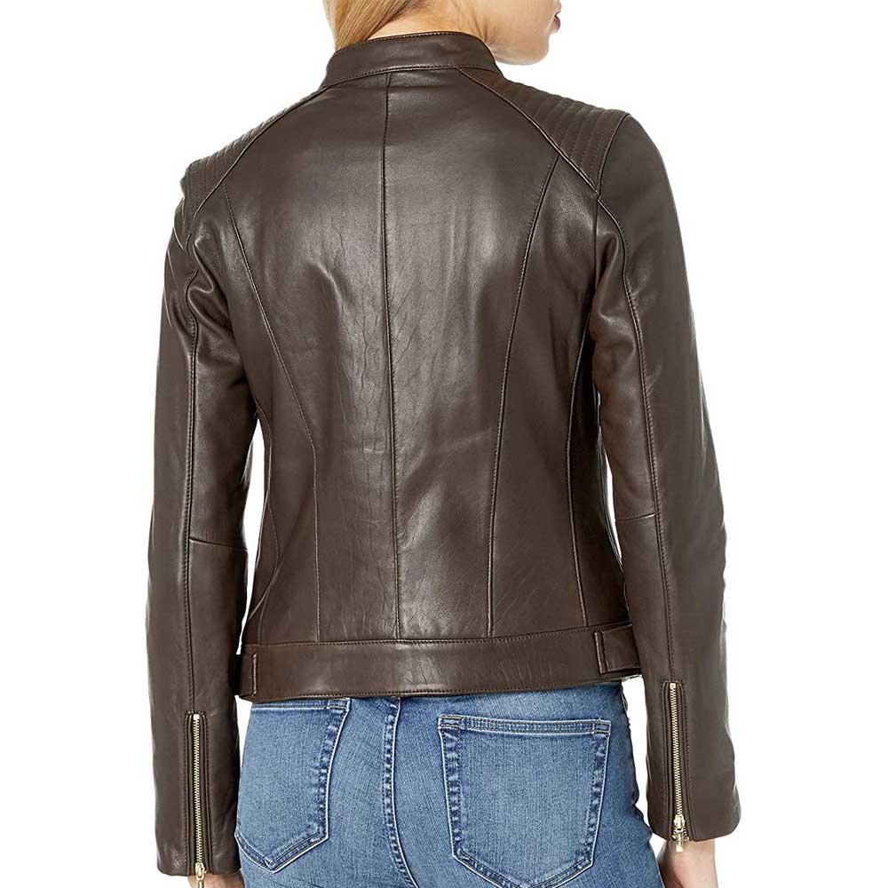 Stylish woman wearing a quilted shoulder leather jacket with metallic zippers