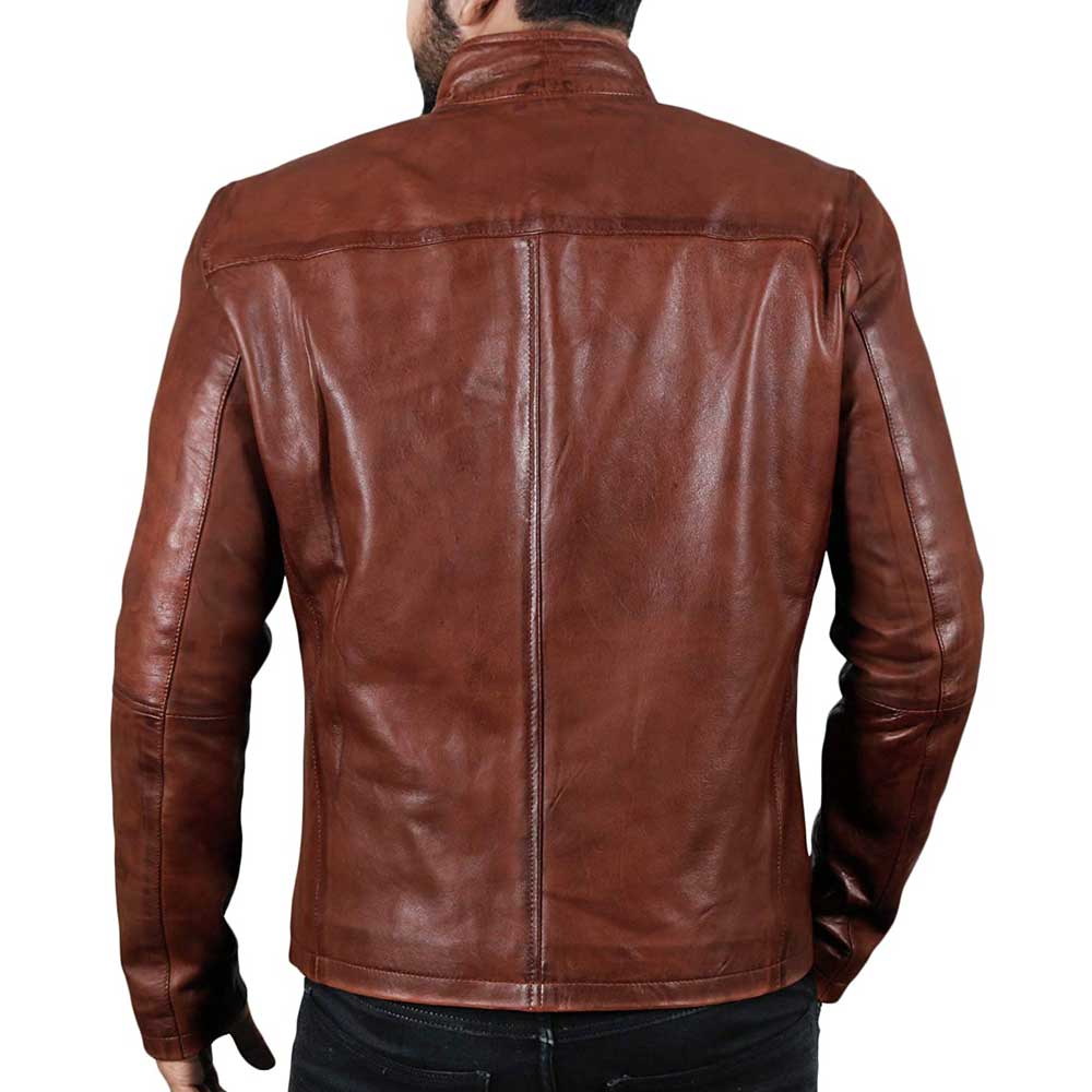 Close-up of high-quality zipper and stand collar on brown leather jacket