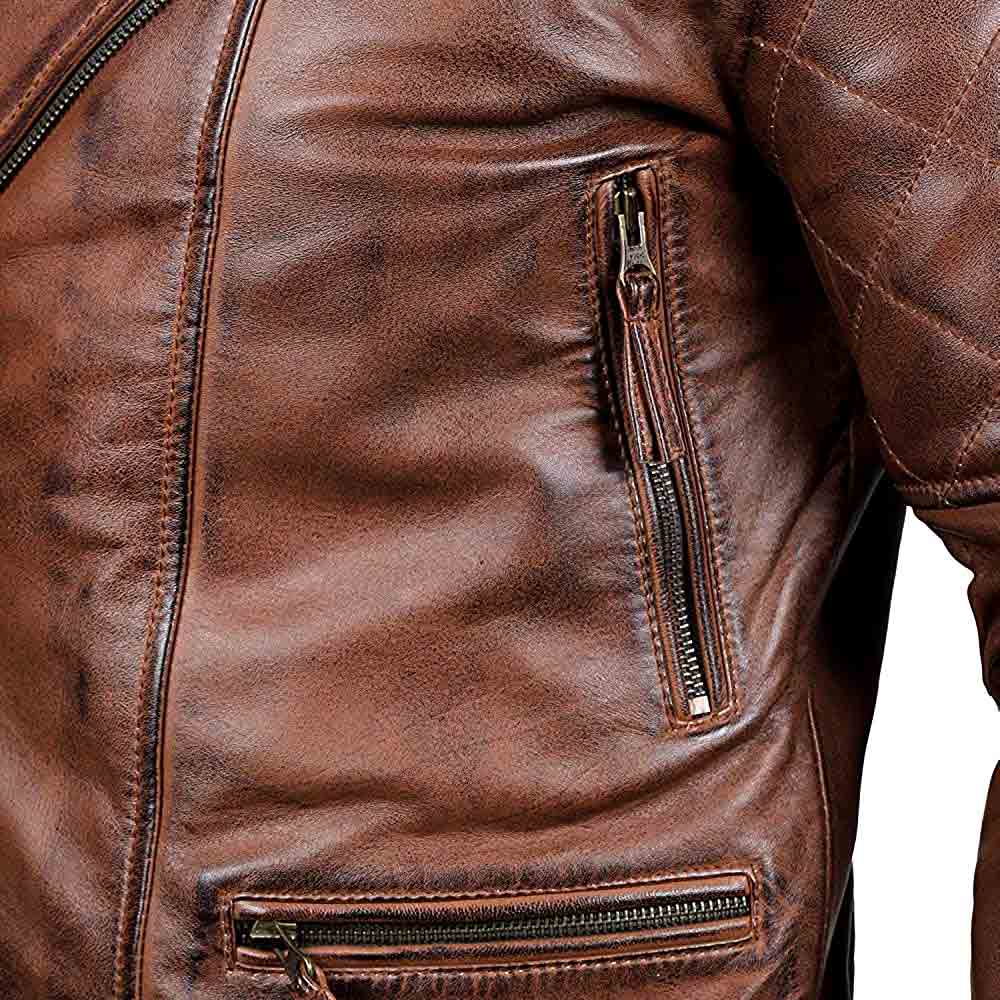 Zipper pockets through out distressed leather jacket