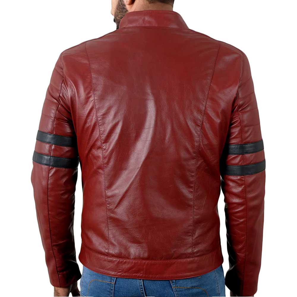The back side of the maroon biker leather jacket, has black stripes on the sleeves