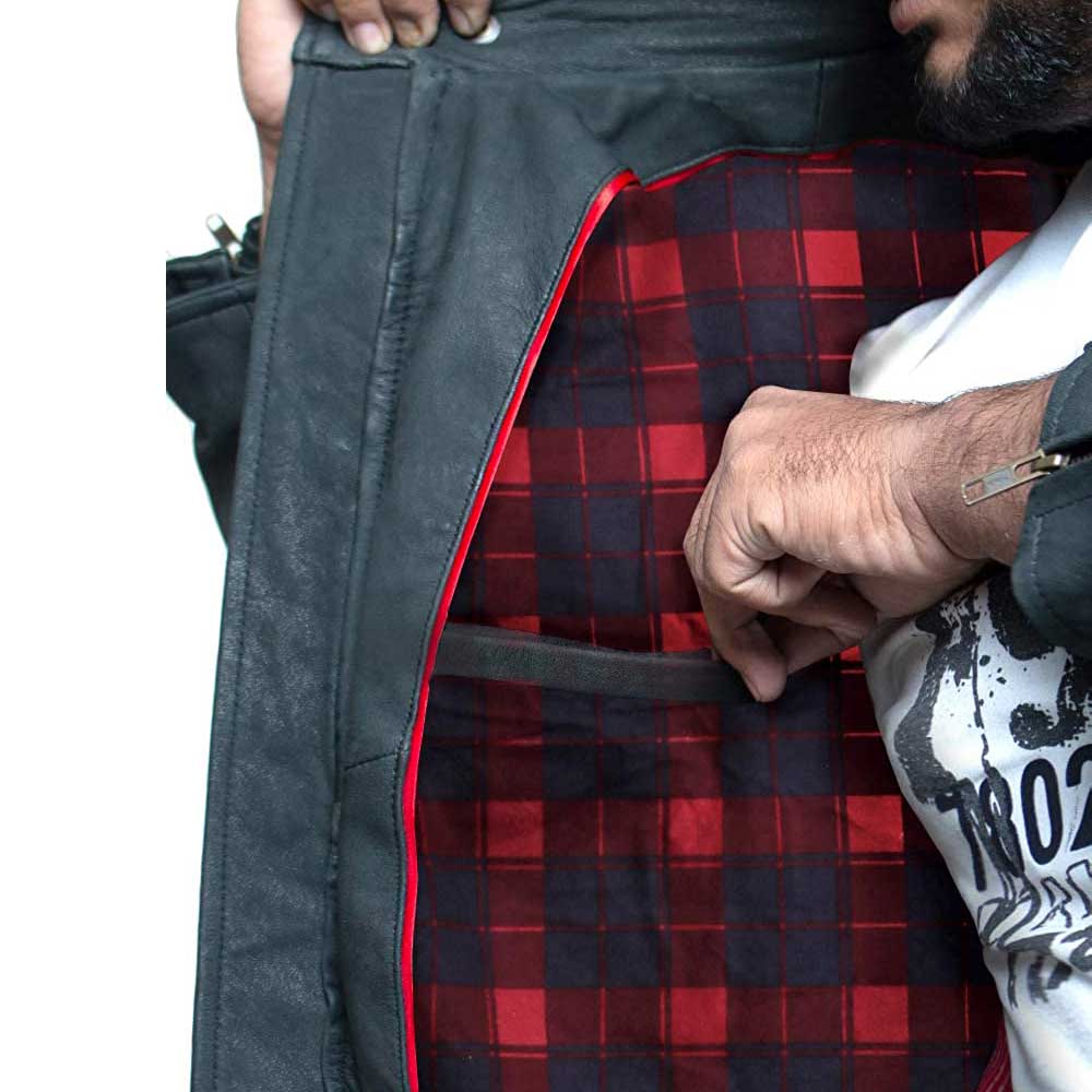 Chest zipper pockets on cognac leather jacket
