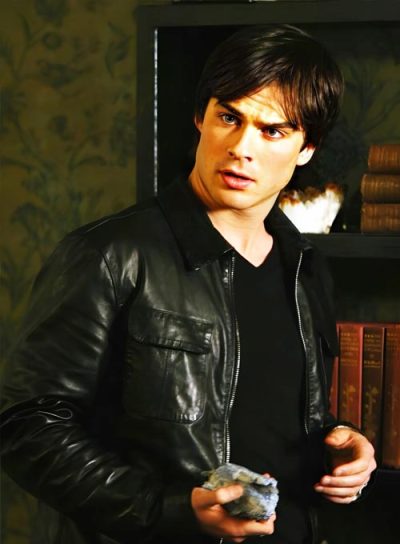 A man wearing the Damon Salvatore Black Leather Jacket, looking confident and stylish.