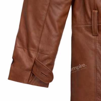 Close-up of leather blazer sleeve showing button detail and leather texture