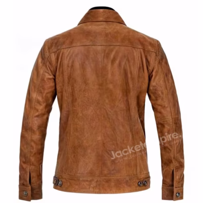 Back view of tan leather jacket showing stitching details Image